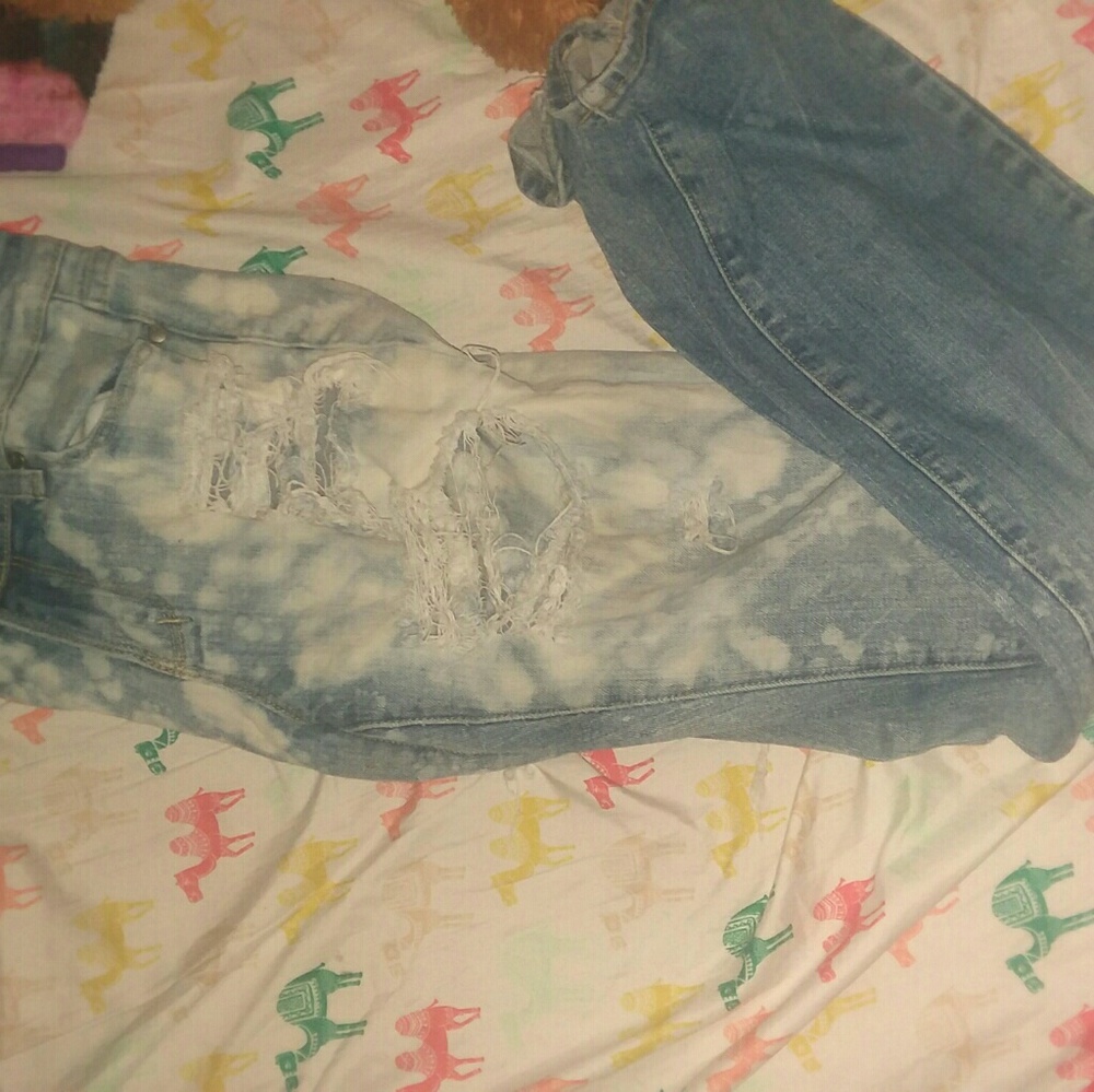 Acid washed ripped jeans